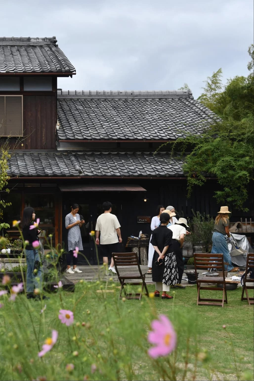 People walking through the garden