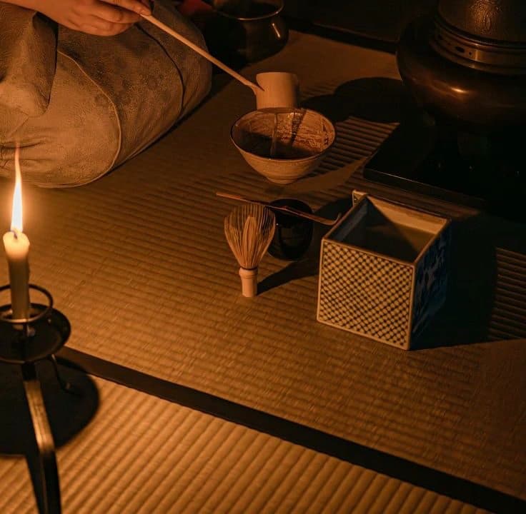 Night tea ceremony by candlelight