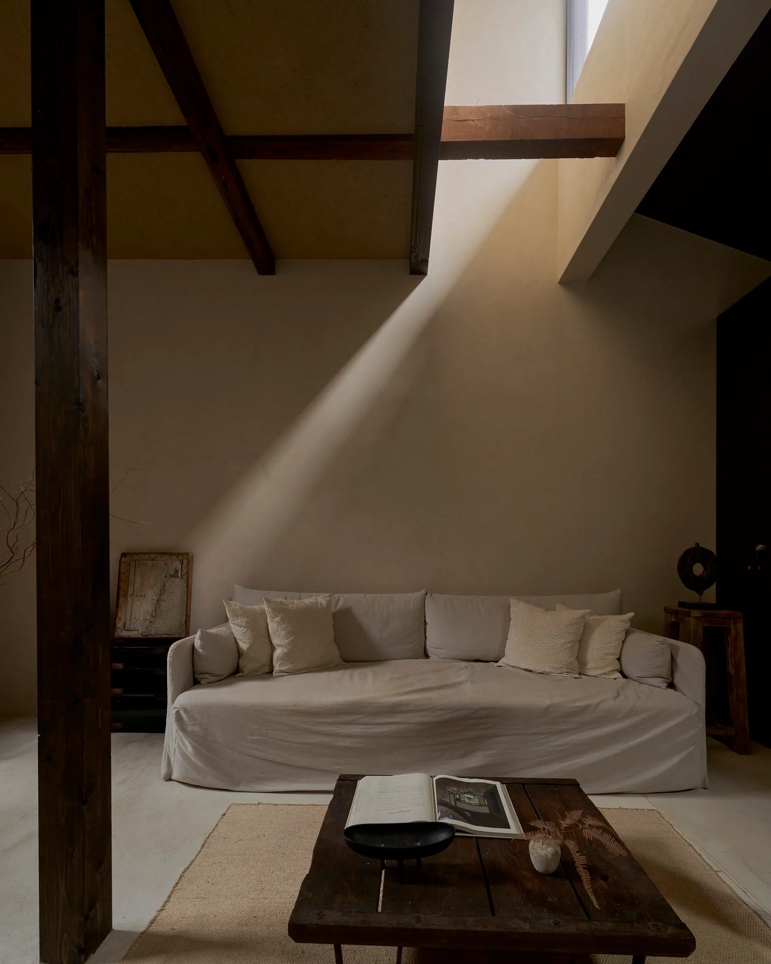 Sofa and low table beneath a skylight in Kiyomizu Suite 3
